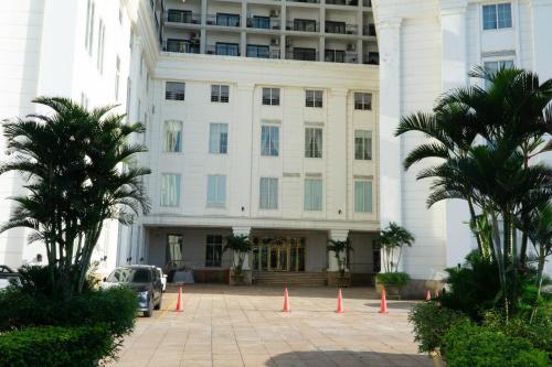 a building with orange cones in front of it at Gold Apartment With Sea View In Da Nang Bay in Da Nang