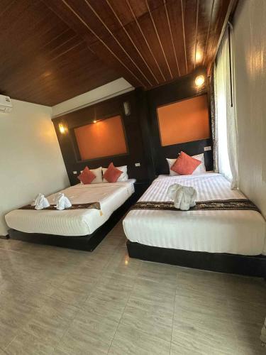 Katil atau katil-katil dalam bilik di The Sea @ Lanta Hotel