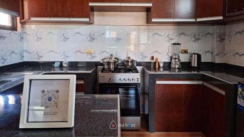 Кухня или мини-кухня в Céntrico apartamento con 2 baños, a pasos de restaurantes y agencias de turismo
