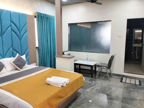 Hotel Royal Inn Lodging And Boardingにあるベッド