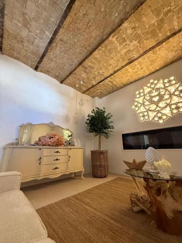 a living room with a couch and a table at La Presentosa b&b in Fossacesia