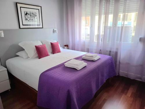 Кровать или кровати в номере Gran Vía Exclusive Apartamento Temporal