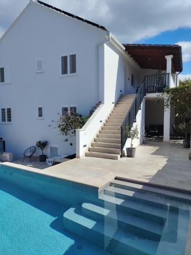 Πισίνα στο ή κοντά στο "Apartments Petra With Swimming Pool"