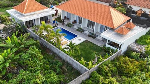 Πισίνα στο ή κοντά στο Umah D'Kancagan