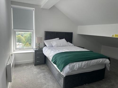 Ένα ή περισσότερα κρεβάτια σε δωμάτιο στο Apartment 3 Shipley