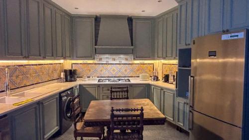 Kuchyň nebo kuchyňský kout v ubytování Dar El Nour Corniche Hammamet