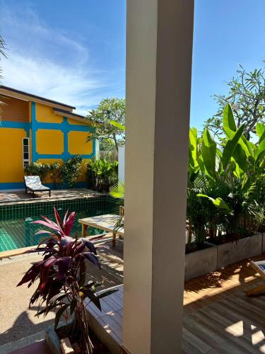 a view of a house with a swimming pool at Lanta Just Come Resort in Ko Lanta Yai
