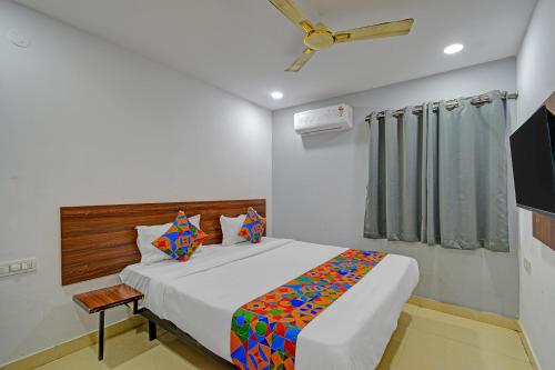 Postel nebo postele na pokoji v ubytování FabHotel Vega