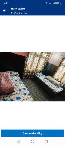 een foto van een slaapkamer met een bed en een spiegel bij Pur guest house in Kathmandu
