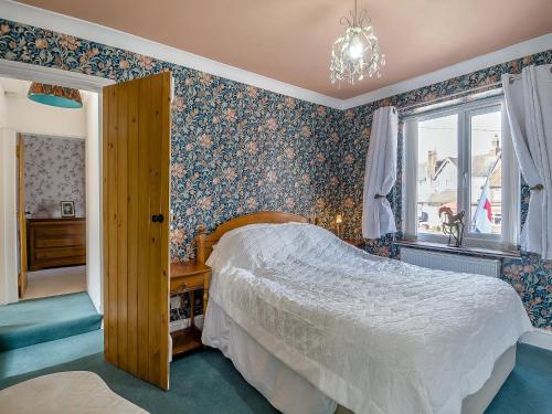 Ένα ή περισσότερα κρεβάτια σε δωμάτιο στο Ravensmere Villa
