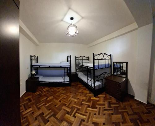 Ένα ή περισσότερα κρεβάτια σε δωμάτιο στο New Enjoy The Hostel