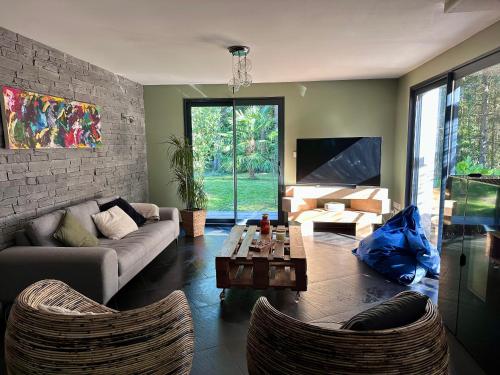 Posezení v ubytování LOFT au calme proche ZOO