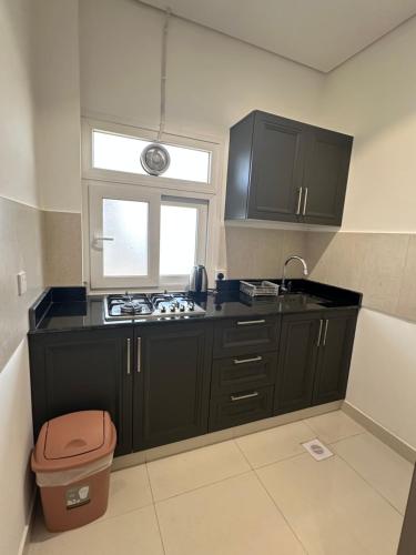 Kuchyň nebo kuchyňský kout v ubytování شقق نستو الجديدة