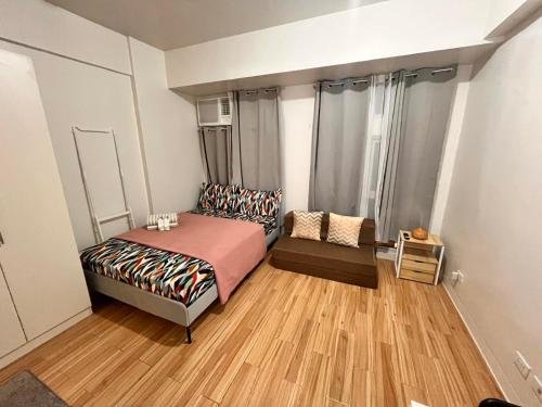 Ένα ή περισσότερα κρεβάτια σε δωμάτιο στο JFam Suites, C4-11K Studio, Up To 4 Pax