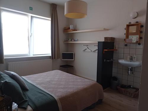 Kuchyň nebo kuchyňský kout v ubytování B&B Emma