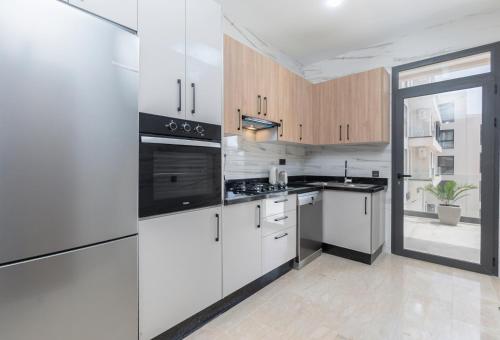 Η κουζίνα ή μικρή κουζίνα στο Luxury appartement with pool in Agadir Bay