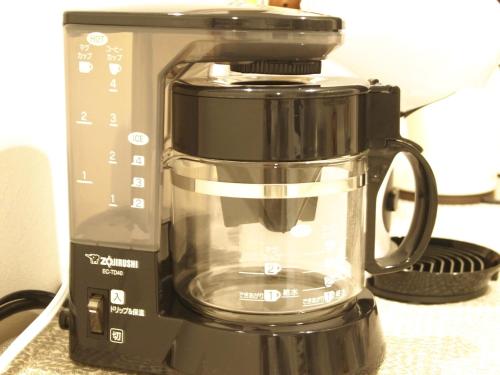 a blender sitting next to a coffee maker at Minpaku 123 - Vacation STAY 15837 in Nasushiobara