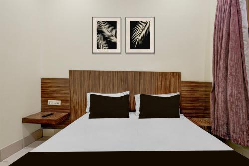 Hotel O Sindhuri Vijayawada Junctionにあるベッド