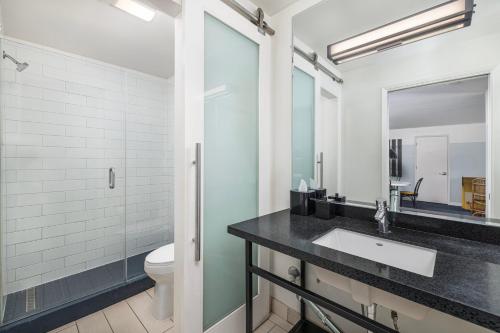 a bathroom with a sink and a toilet at Hotel Erwin Venice Beach in Los Angeles