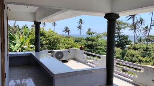 a view from the balcony of a house at Marhba home stay in Varkala