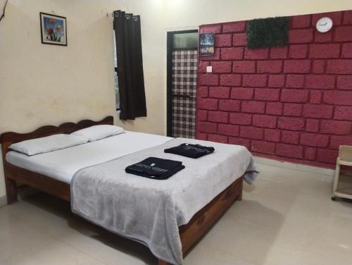 Katil atau katil-katil dalam bilik di Waterfront Beach Resort