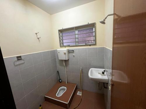 Koupelna v ubytování Homestay Seri Pagi