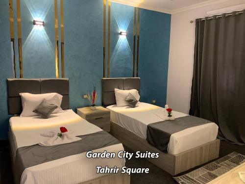 Cama o camas de una habitación en Garden City Suites Tahrir Square