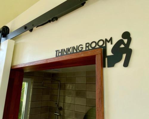 a bathroom with a sign that says thinking room at 오를 Orle in Kama-ri