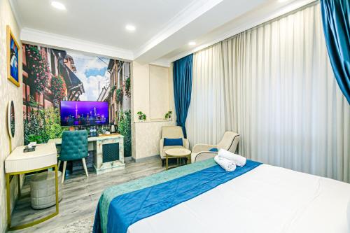 Ένα ή περισσότερα κρεβάτια σε δωμάτιο στο Essam Deluxe Hotel