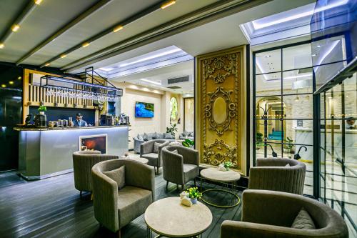 Χώρος καθιστικού στο Essam Deluxe Hotel