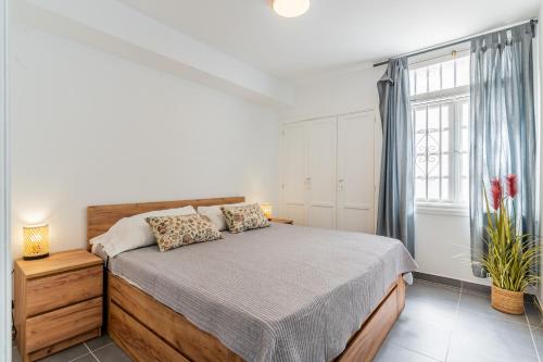 Postel nebo postele na pokoji v ubytování Renovated apartment with sunny terrace and ocean views in Malibu Park Tenerife