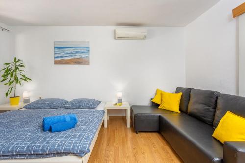 Ένα ή περισσότερα κρεβάτια σε δωμάτιο στο Residence Tomani with XXL pool