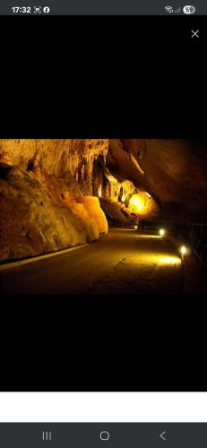 a tunnel with a road in a cave at La Rondine in Villamassargia