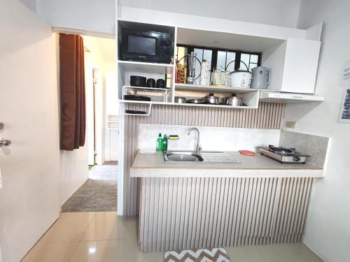 Kuchyň nebo kuchyňský kout v ubytování Apartment near Malls