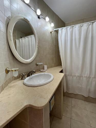 Koupelna v ubytování Complejo LA OMA, ubicado a 400 mts del mar con estacionamiento privado