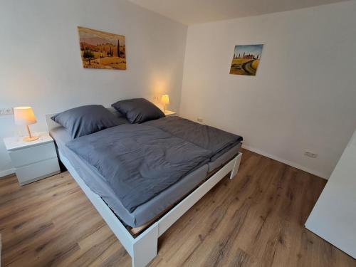 Postel nebo postele na pokoji v ubytování MainTraum