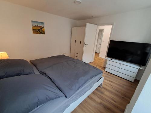Postel nebo postele na pokoji v ubytování MainTraum