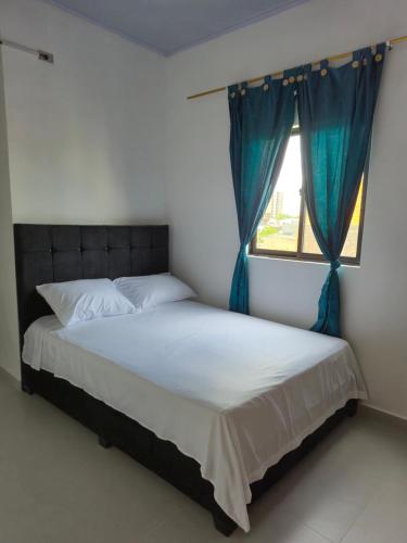 Кровать или кровати в номере APARTAMENTO RiNCON DEL MAR 403
