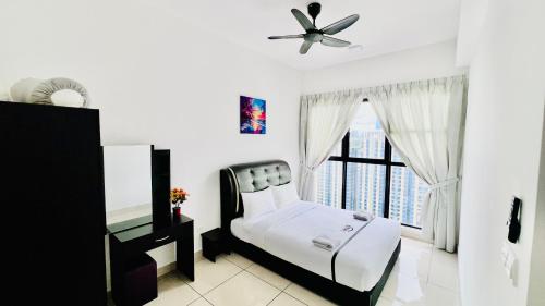Ένα ή περισσότερα κρεβάτια σε δωμάτιο στο Trion KL Premium Residence