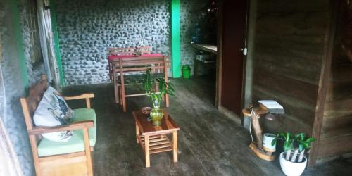 an overhead view of a room with a table and chairs at Cabanas Armonia in Cotundo