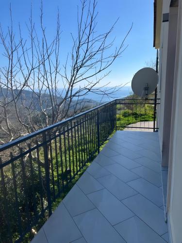 a balcony with a view of the mountains at Dente Di Leone in San Mauro Cilento