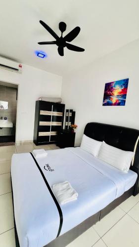Ένα ή περισσότερα κρεβάτια σε δωμάτιο στο Trion KL Premium Residence