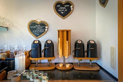 a counter with two hair dryers on display in a store at Ferienanlage Zum Wildbach Schierke in Schierke