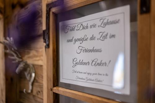 a sign for a wedding in a window at Ferienhaus Goldener Anker Unterach am Attersee in Unterach am Attersee