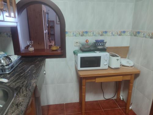 Η κουζίνα ή μικρή κουζίνα στο Lourdes 1 casa compartida solo con la anfitriona