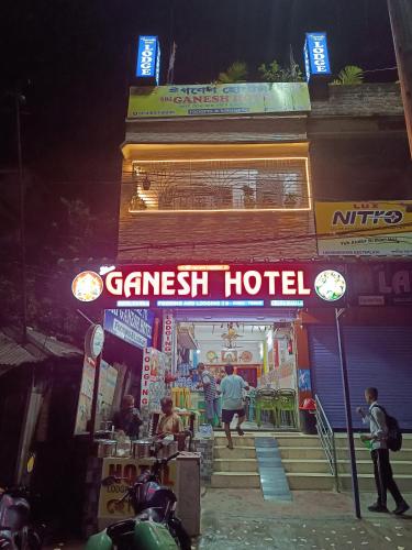 a restaurant with a sign that reads genesis hotel at SRI Ganesh Hotel Fooding & Lodging in Bongaigaon