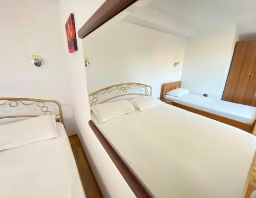 Apartamente & Dhoma Me Qera Ditore