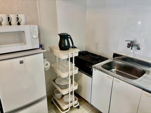 Una cocina o cocineta en Base203