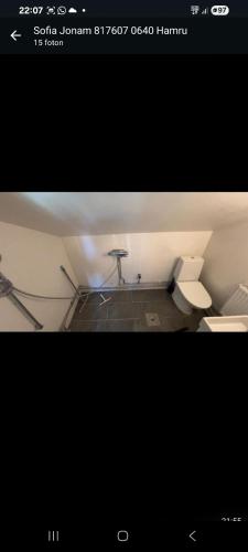 a picture of a room with a table in it at Östa 264 in Märsta