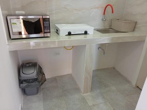Una cocina o cocineta en Cojimies Suite